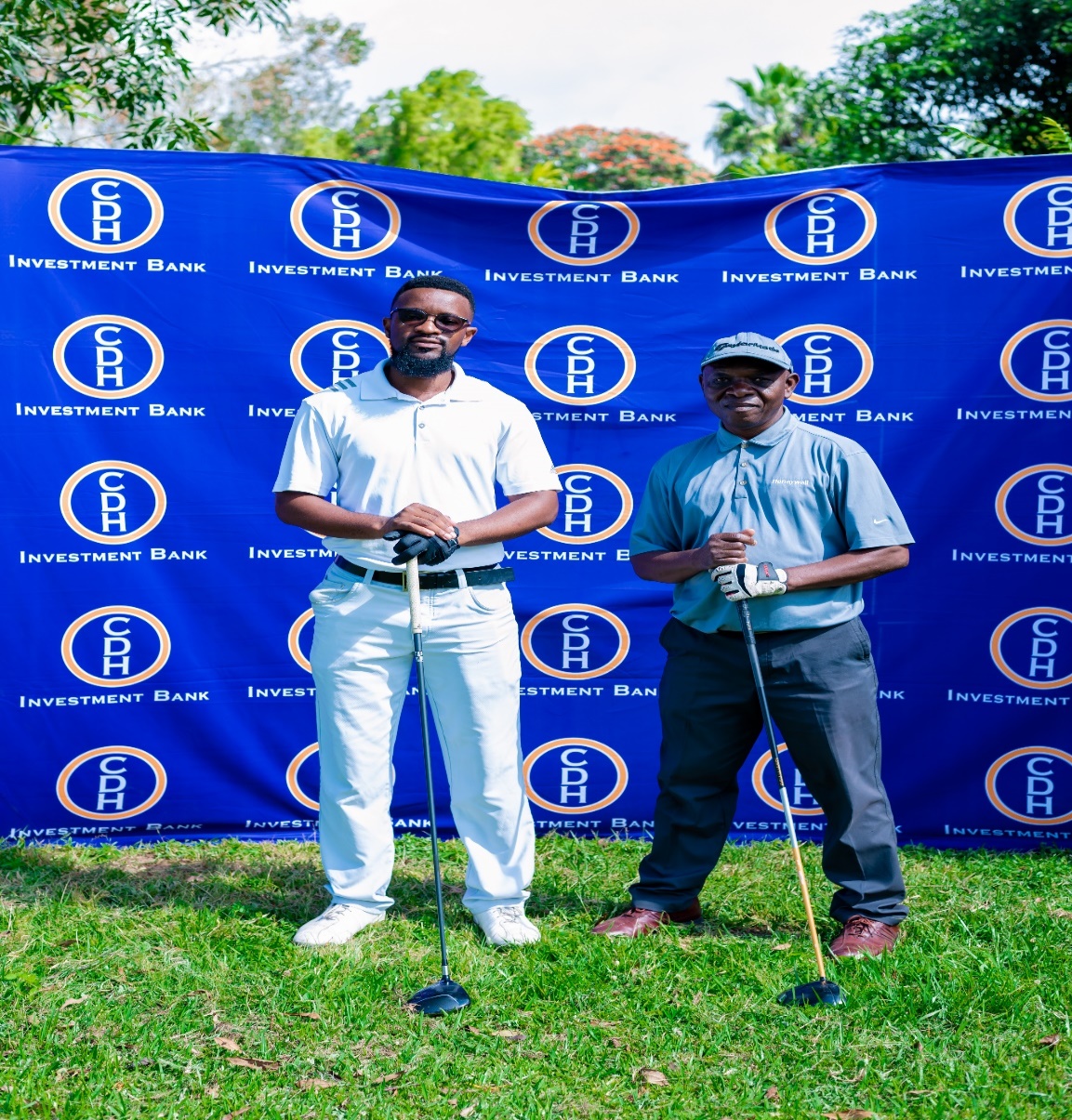 In the picture: Team 1 of Mr Chifundo Lingao (Left) and Mr Sope Kaira (right) who represented CDH Investment Bank at the golf tournament