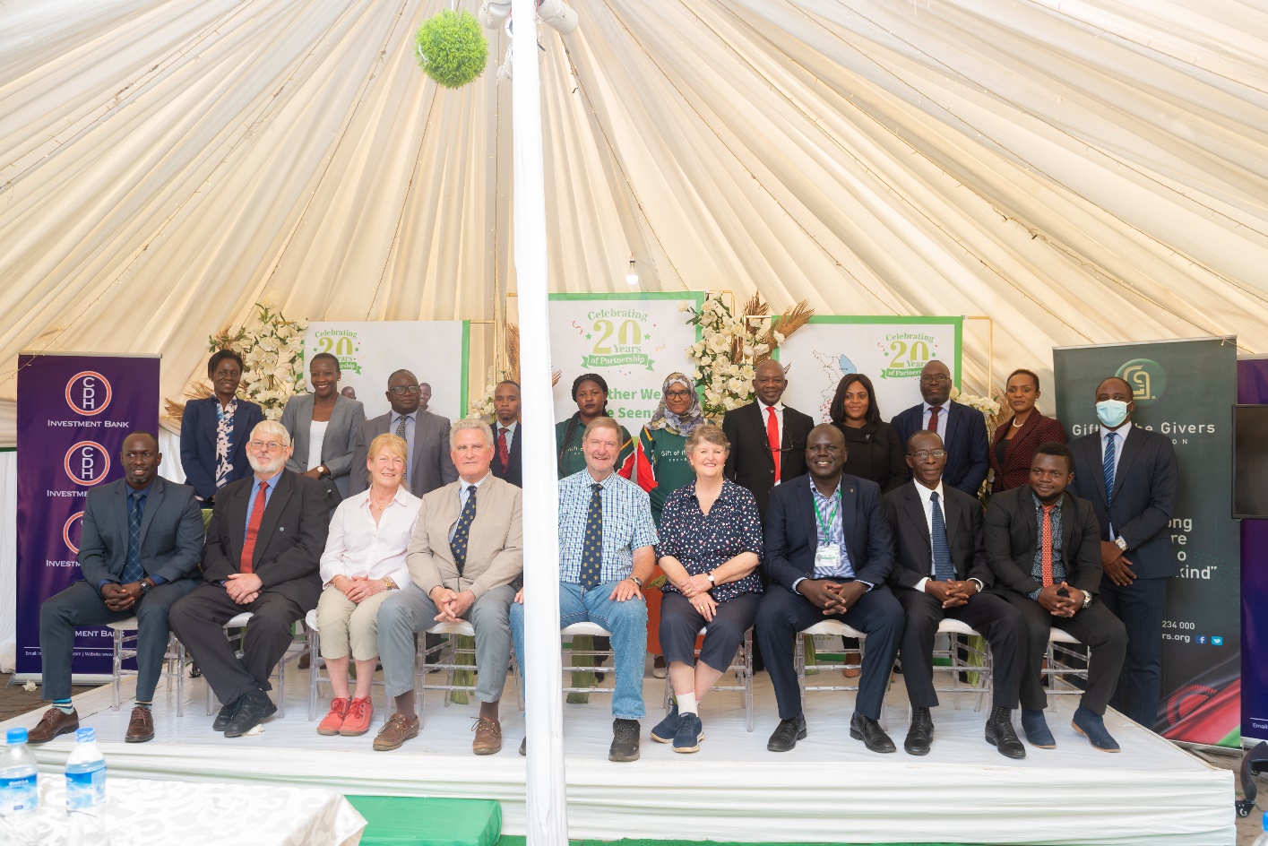 In the picture: Various invited guests who attended the partnership event.  Mr Peter Kyalo Chief Program Officer Beit Cure (1st L front row), Cure Malawi Board Chair Mr John McGrath (2nd L front row), representatives from the Beit Trust, CDH Investment Bank Chief Executive Officer, Mr Kwame Ahadzi (2nd right front row), Beit Cure International Hospital Executive Director Mr Elly Chemey (3rd R front row)